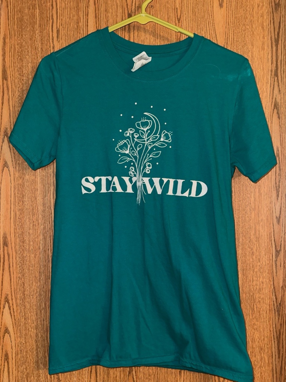 Gildan Teal Women's Short Sleeve Tee with White "Stay Wild" Floral Graphic